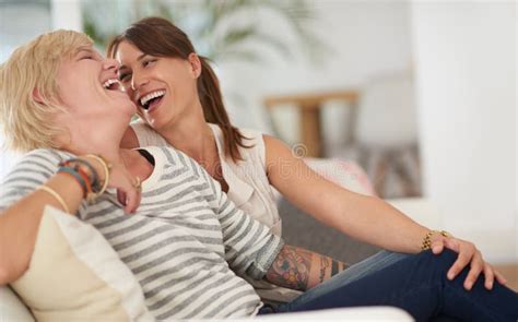 Home Couple And Lesbian With Love Women And Bonding Together With Humor Laughing And