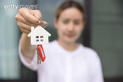 House Key In Hand Female Hand Holding House Key Real Estate Agent