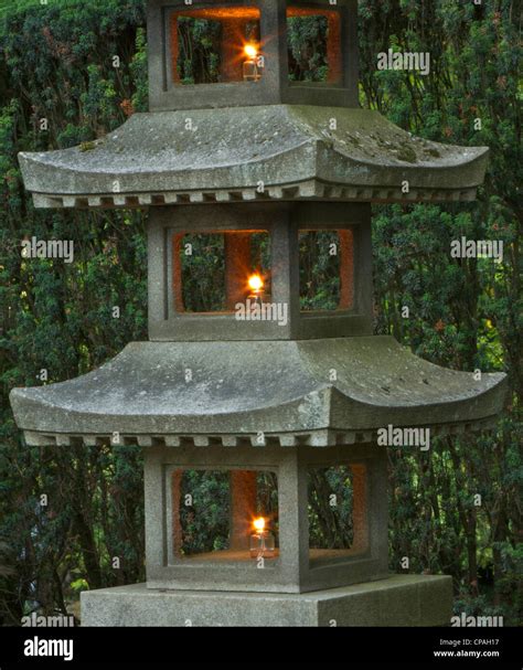 Illuminated Stone Pagoda Lantern In Portland Japanese Garden Stock