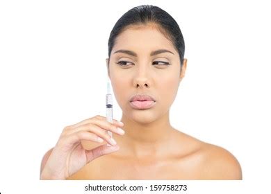 Serious Nude Brunette Holding Injection Looking Stock Photo