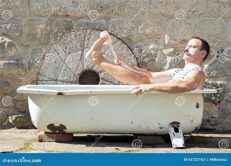Naked Man Lying Bathtub Stock Photos Free Royalty Free Stock Photos From Dreamstime