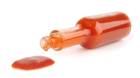 The Hack To Make Dressing Out Of An Almost Empty Hot Sauce Bottle