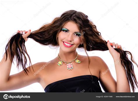 Attractive Brunette Smiles Beautifully White Teeth Holds Her Hair Beautiful Stock Photo