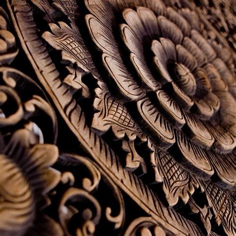 An Intricately Carved Piece Of Wood On Display