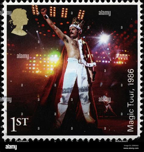 Freddie Mercury In Concert With The Queen On Postage Stamp Stock Photo