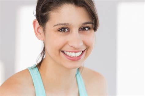 Premium Photo Fit Brunette Smiling At Camera
