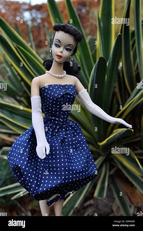 1959 1 Vintage Barbie Wearing 1959 Gay Parisienne Dress And Fur Stole By The First Barbie Doll