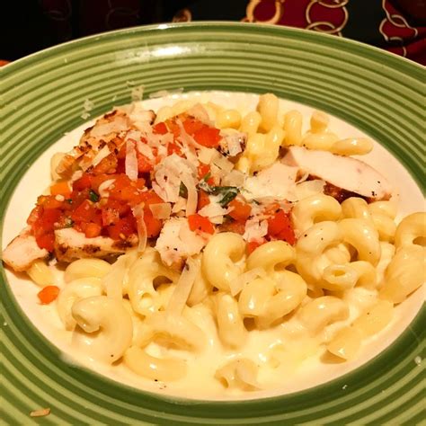 Delicious elbow #pasta in Alfredo with chicken and Italian veggies at #