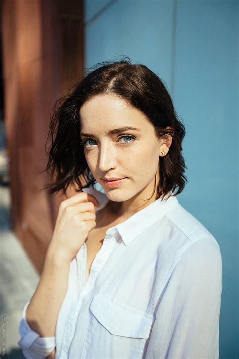 Beautiful Brunette Looking At Camera Del Colaborador De Stocksy Vero Stocksy