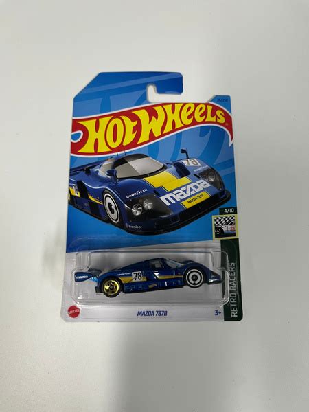 Машинка Hot Wheels коллекционная оригинал 2023 MAZDA 787B купить с доставкой по выгодным