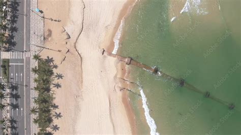 Stockvideo Large Rusty Pipeline Exposed On The Beach Of Ipanema After A