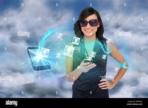 Glamorous Brunette Using Smartphone With Profile Pictures Stock Photo