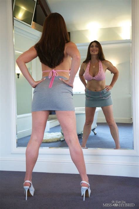 Miss Hybrid Watches Herself Fucking A Big Dildo Photos