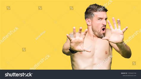 Handsome Shirtless Man Showing Nude Chest Stock Photo 1335402740 Shutterstock