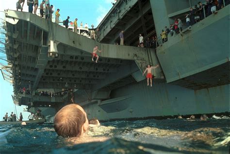 Us Navy Sailors Leap From Ships Around The World During Swim Call