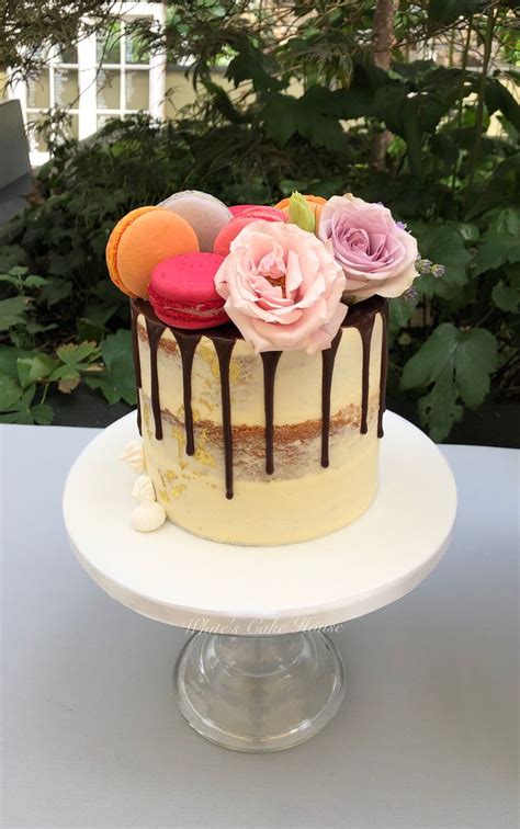 Semi Naked Drip Wedding Cake With Macarons And Fresh Flowers Cake Decorating Cake Wedding Cakes