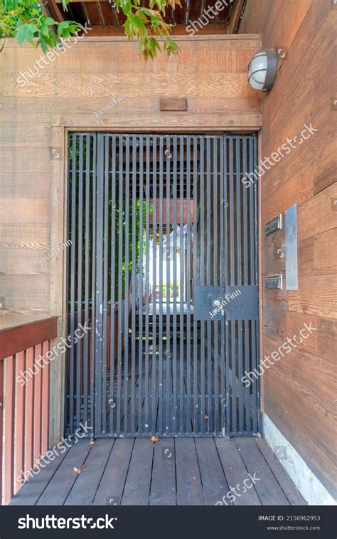 Wrought Iron Gate Wood Planks Walls Stock Photo 2156962953 | Shutterstock