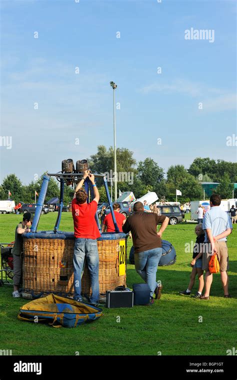 Balloonists Aeronauts Preparing Hot Air Balloon For Taking Off During