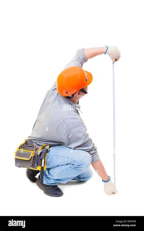 Worker With A Tape Measure Isolated On White Stock Photo Alamy