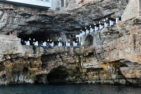 Scenic Cliffside Restaurant in Polignano a Mare, ItalyFree Stock Photo