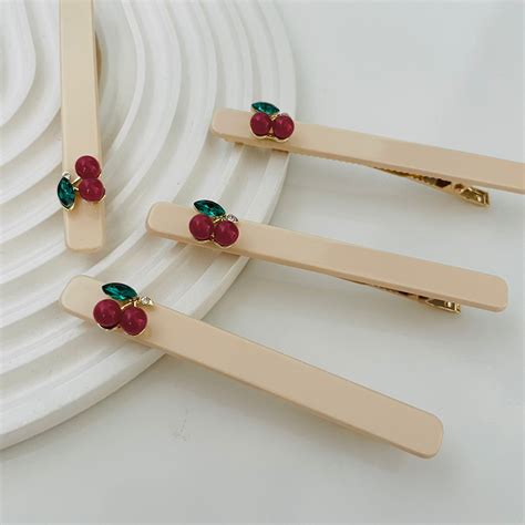 PRESILHA BICO DE PATO ACETATO NUDE CEREJA CHERRY SINRETH LIMA