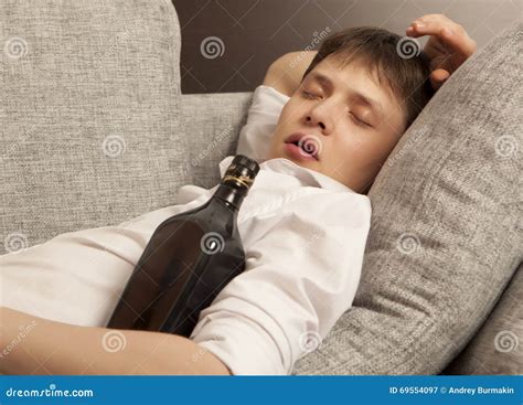 Drunkard. a Young Man with a Drinking Problem is Relaxing Stock Image - Image of alcohol ...