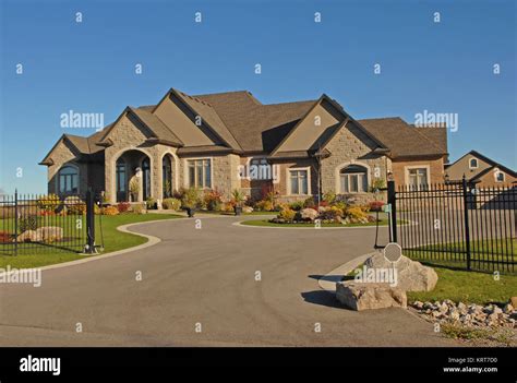 Large mansion with driveway Stock Photo - Alamy