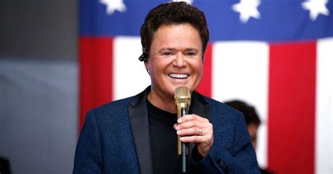 Lifelong Fan Has Surreal Reaction To Donny Osmond Crashing Her 60th