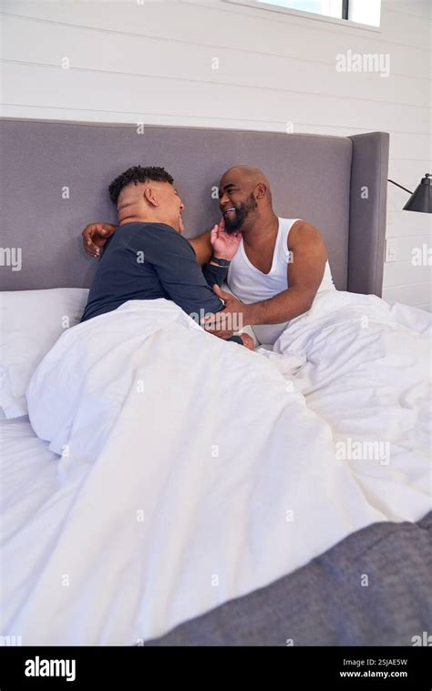 Gay Couple In Bed Stock Photo Alamy