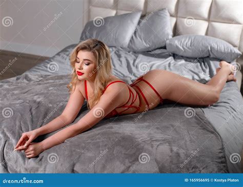 Blonde In Red Lingerie Posing In Studio Stock Image Image Of