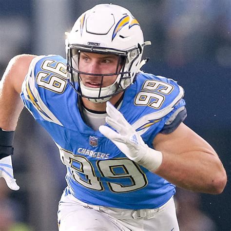 Download Joey Bosa Football Player Running Speed Wallpaper | Wallpapers.com