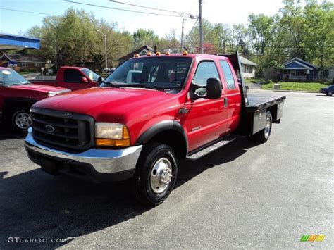 2000 Red Ford F350 Super Duty Lariat Crew Cab 4x4 Dually Flat Bed