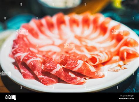 Beef Slices For Chinese Hot Pot With Boiling Mala Spicy Soup Stock Photo Alamy