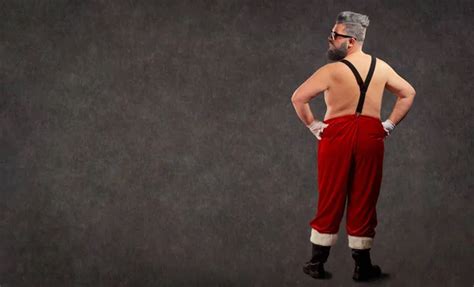 Santa Claus With A Naked Belly With Suspenders Smiles Stock Photo Lacheev 219888214