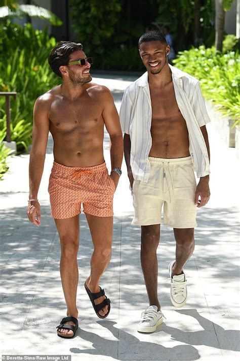 TOWIE S Amber Turner Flaunts Her Washboard Abs In A Patterned Bikini As She Joins Castmates On