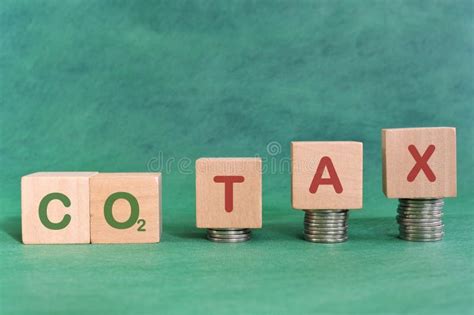 Carbon Co2 Emission Taxation Concept Carbon Tax Word In Wooden Blocks