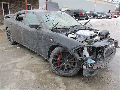 Wrecked Dodge Charger Hellcat Shows Up For Sale Is Full Of Bullet