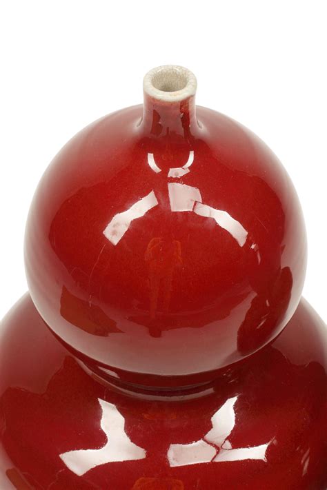Lot A Pair Of Chinese Oxblood Porcelain Gourd Vases