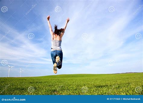 Young Beautiful Woman Jumping For Joy Stock Photos Image 31171563