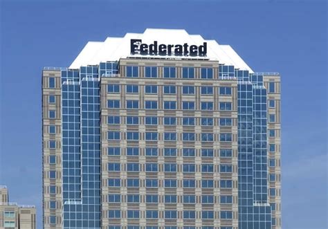 coming    sign  pittsburgh skyline  federated shifts focus