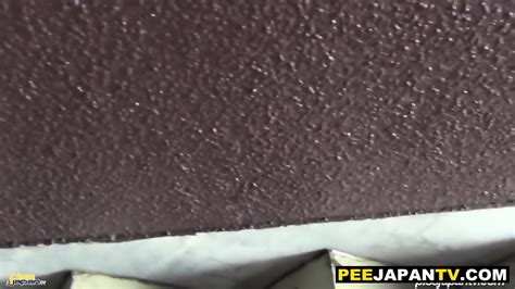 Kinky Asian Babe Pissing On Street