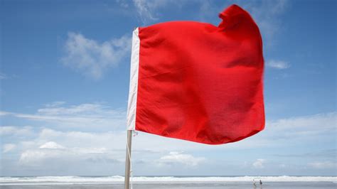 What It Really Means When You See A Red Flag At The Beach