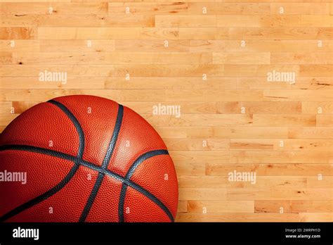 Basketball And Hardwood Maple Basketball Court Floor Viewed From Above