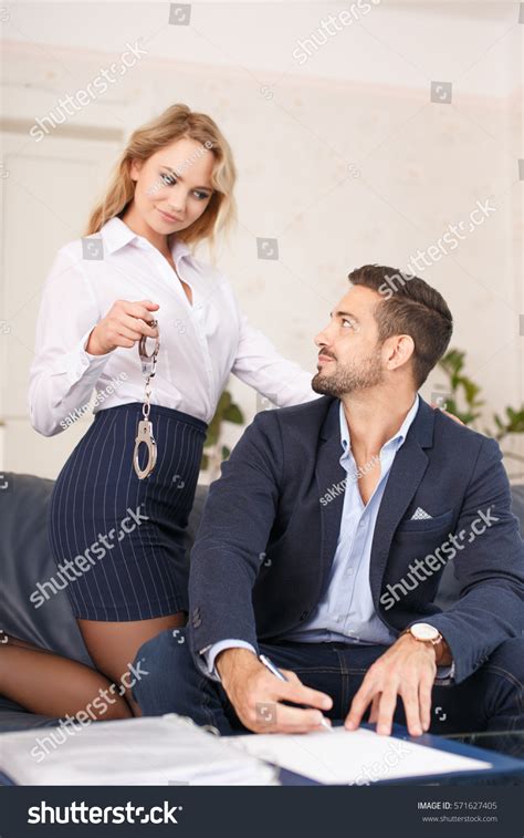 Sexy Blonde Secretary Offering Handcuffs Boss Stock Photo 571627405 Shutterstock