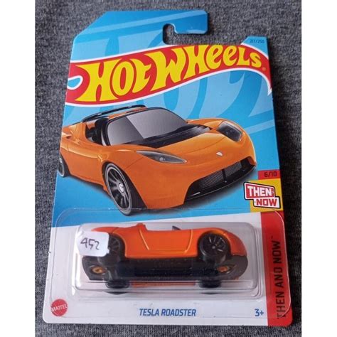 Jual Hot Wheels Tesla Roadster Then And Now Orange Shopee Indonesia
