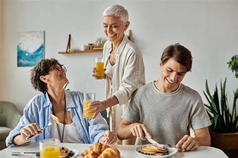Lesbian Parents Joyfully Share Breakfast With Stock Photo Image Of Breakfast Support