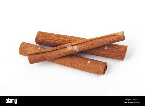 Three Cinnamon Sticks Stock Photo Alamy