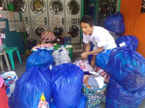 Bags of dirty clothes fill laundry shop in Tondo to its capacity ...