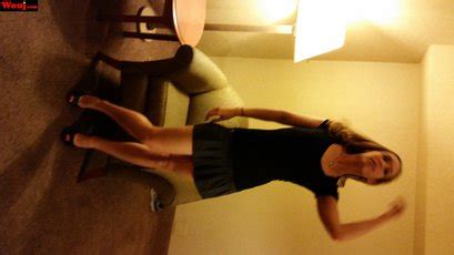 Hot Blonde Amateur In Black Dress Poses Seductively For The Camera Photos