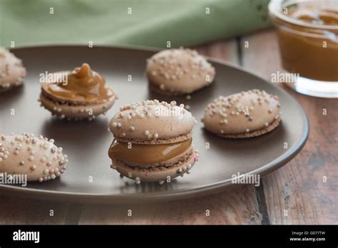 Dulce De Leche Filled Macaron Stock Photo Alamy